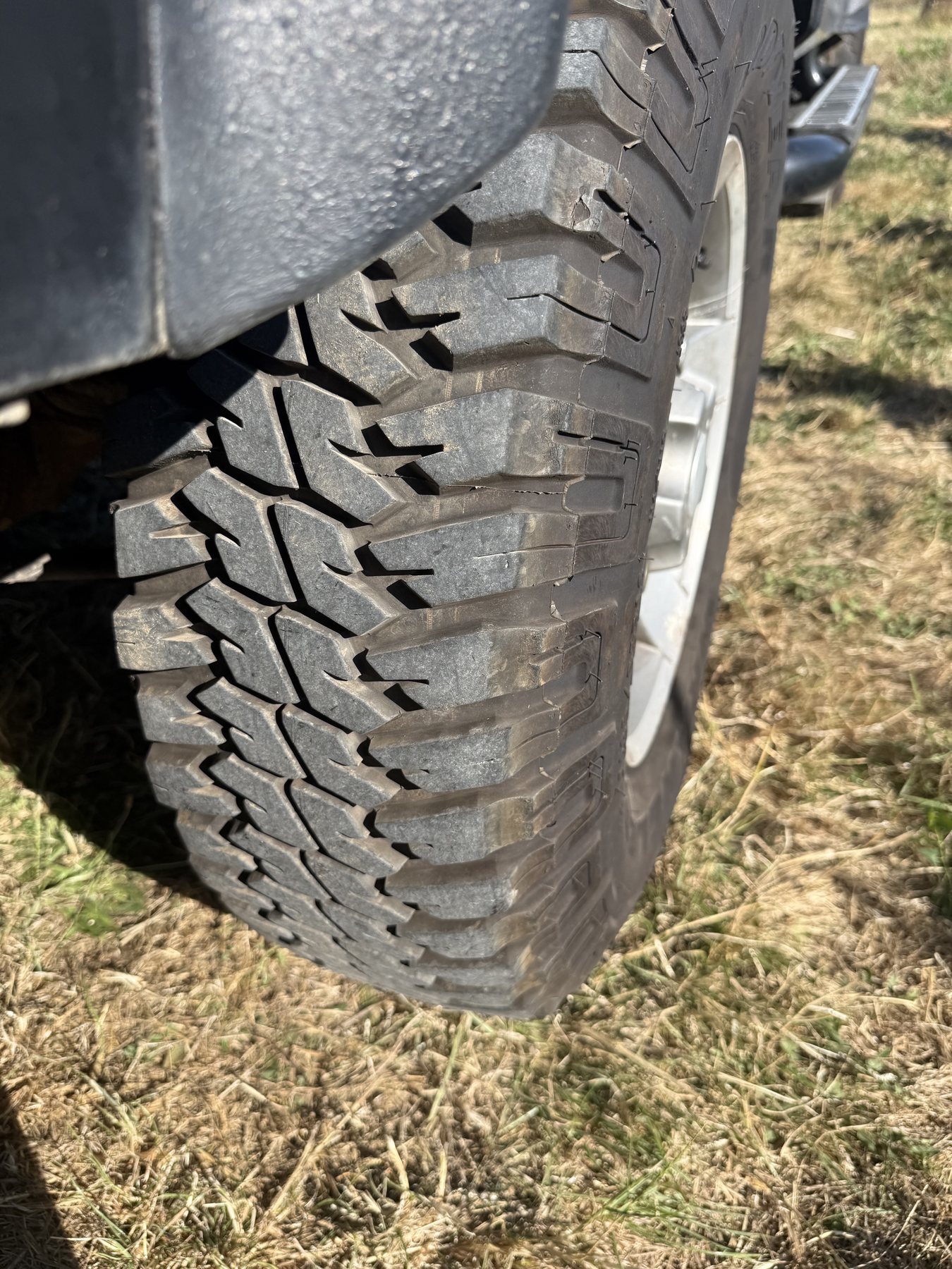 Close-up of the chunky tread on one fitted tyre