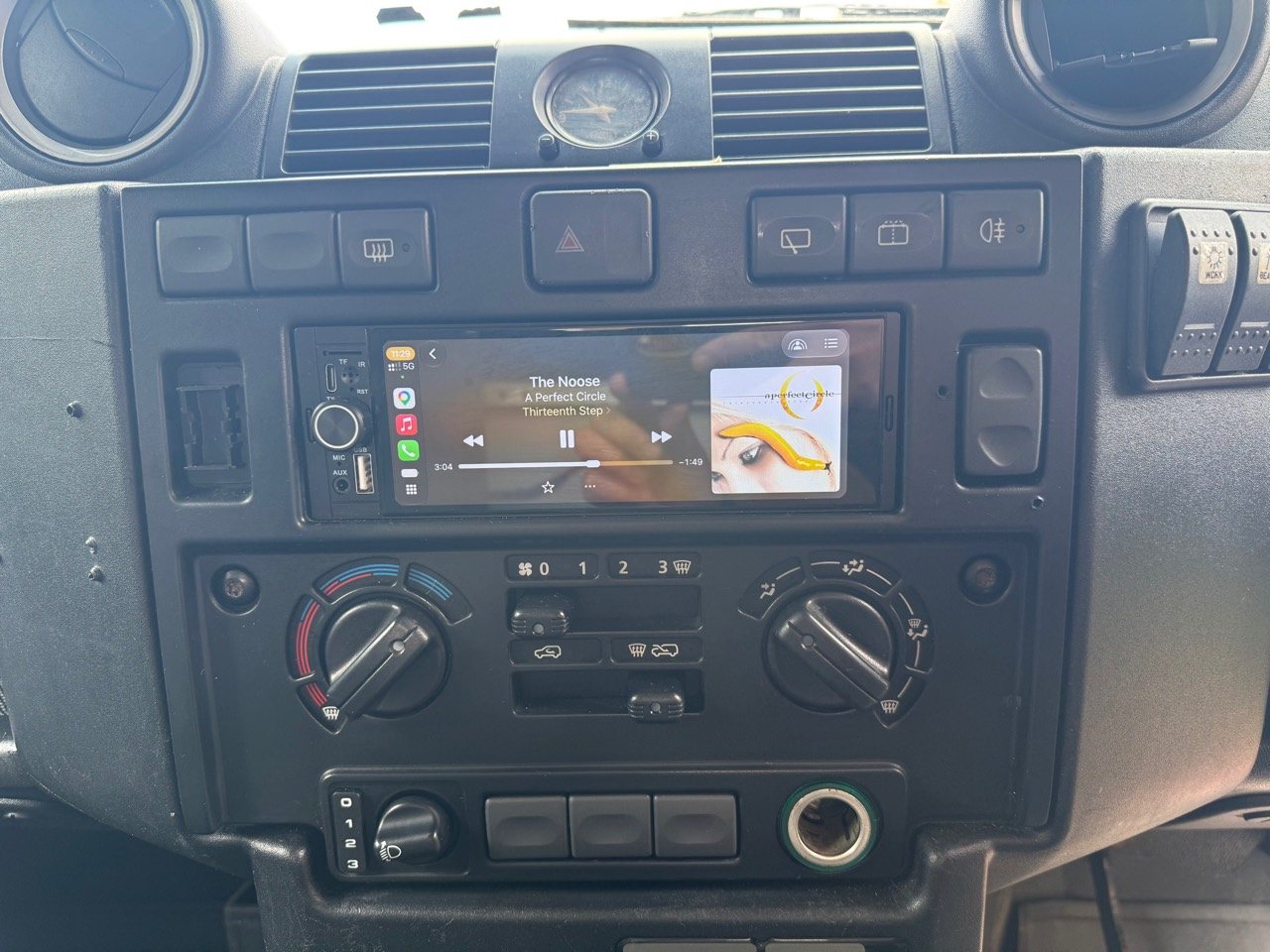 Dashboard head unit displaying wireless Apple CarPlay