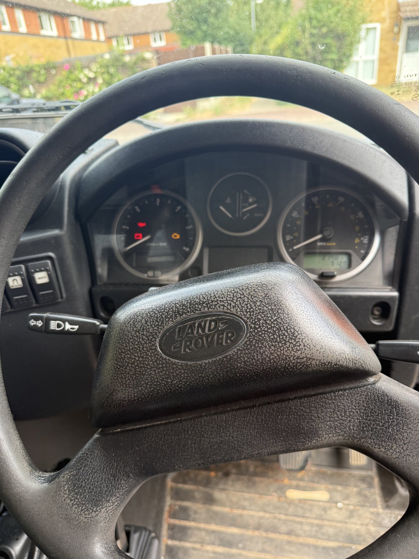 Land Rover steering wheel and instrument cluster from the driver's seat